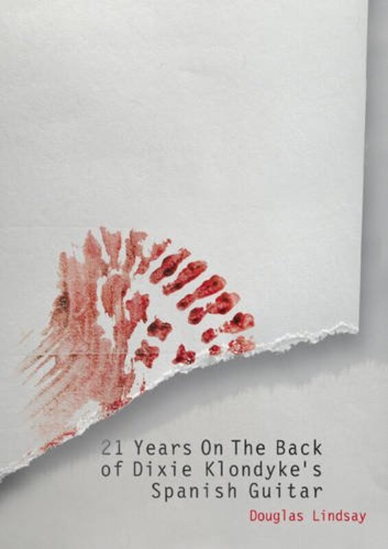 Book cover for "21 Years on the Back of Dixie Klondyke's Spanish Guitar" by Douglas Lindsay