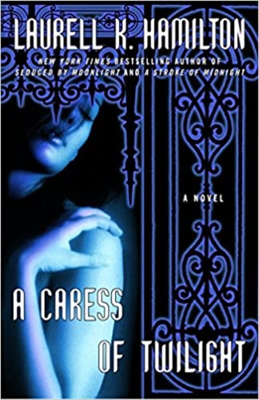 Book cover for "A Caress of Twilight" by Laurell K. Hamilton
