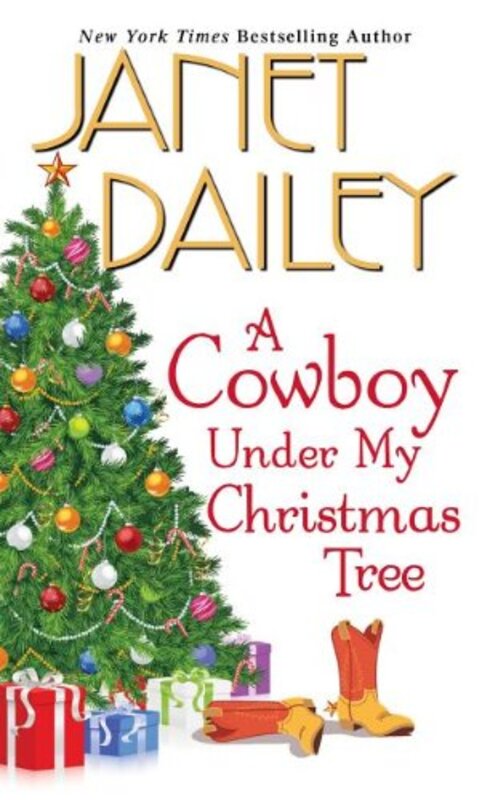 Book cover for "A Cowboy Under My Christmas Tree" by Janet Dailey