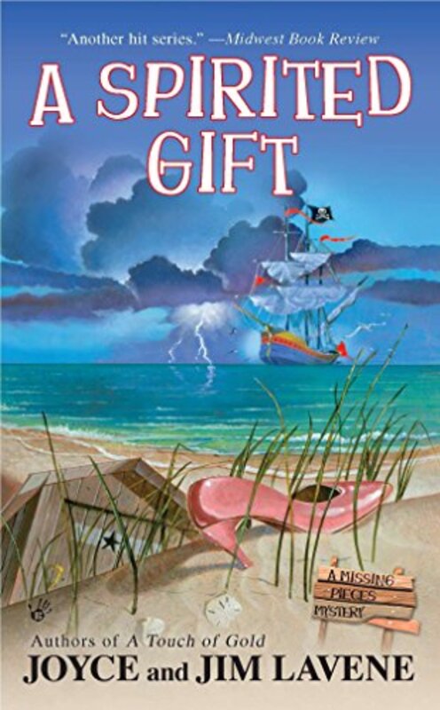 Book cover for "A Spirited Gift" by Joyce and Jim Lavene