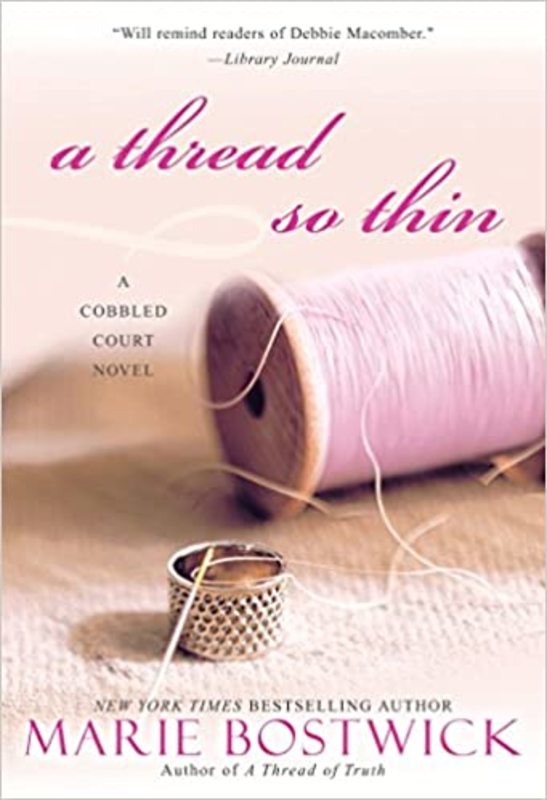 Book cover for "A Thread So Thin" by Marie Bostwick