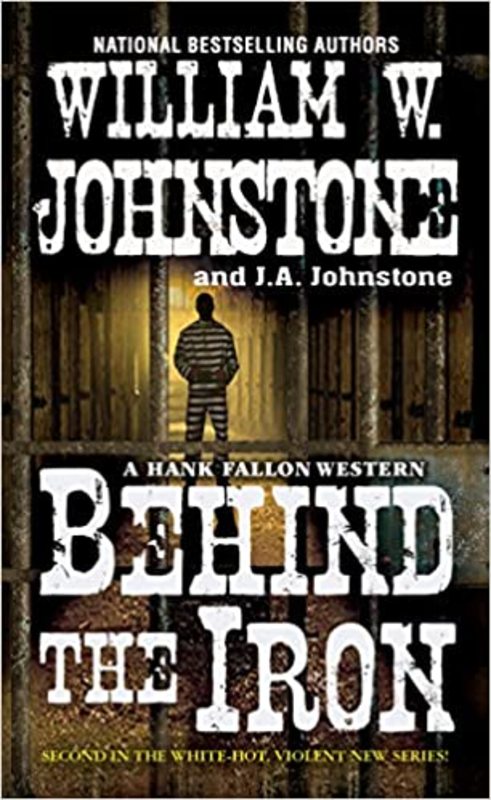 Book cover for "Behind the Iron" by J A Johnstone