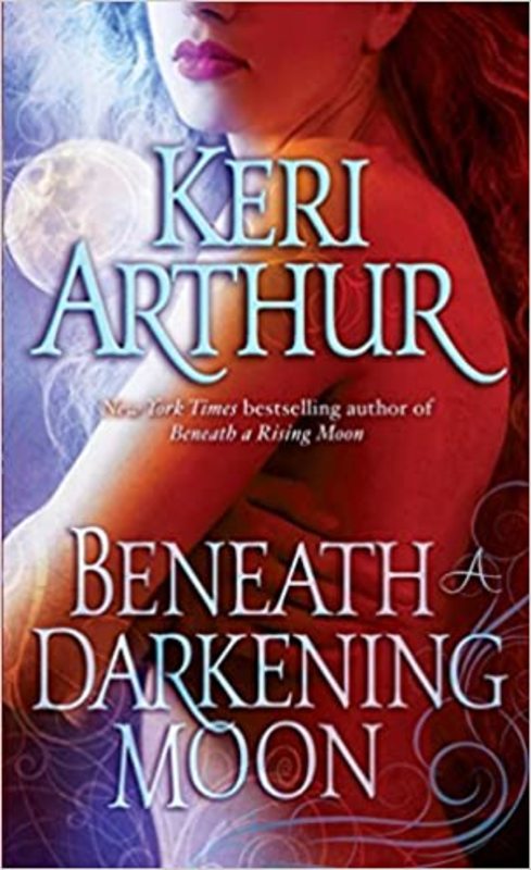 Book cover for "Beneath a Darkening Moon" by Keri Arthur