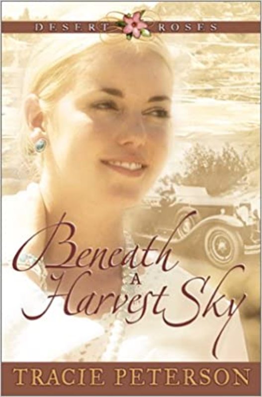 Book cover for "Beneath a Harvest Sky" by Tracie Peterson