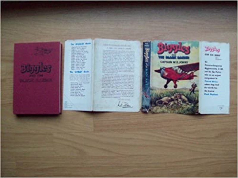 Book cover for "Biggles and the Black Raider" by Captain WE Johns