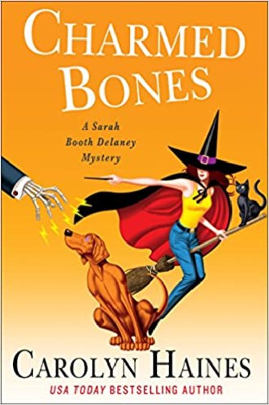 Book cover for "Charmed Bones" by Carolyn Haines