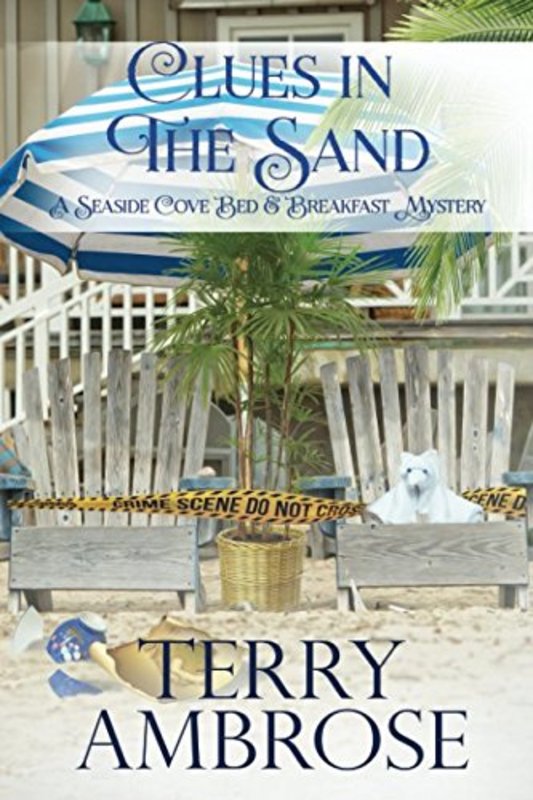 Book cover for "Clues in the Sand" by Terry Ambrose