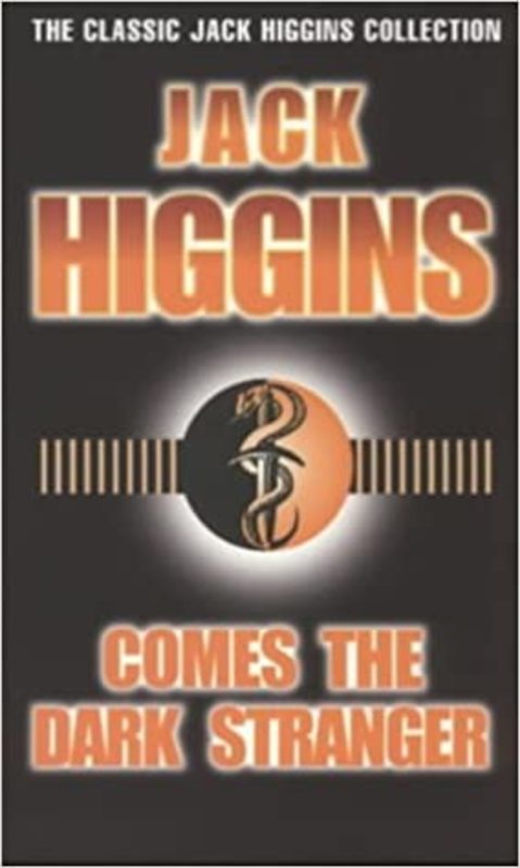 Book cover for "Comes the Dark Stranger" by Jack Higgins