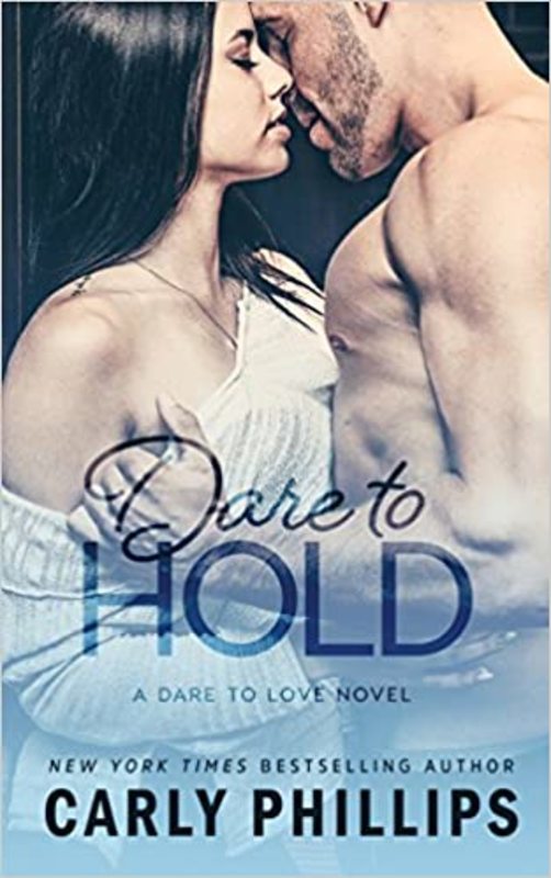 Book cover for "Dare to Hold" by Carly Phillips