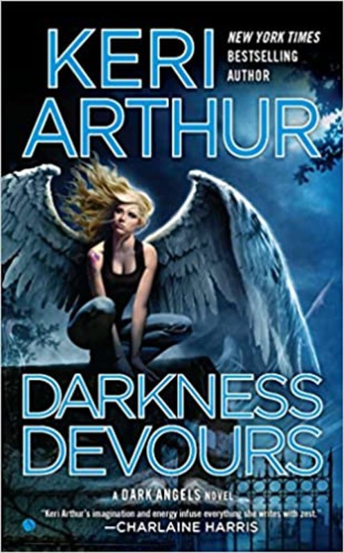 Book cover for "Darkness Devours" by Keri Arthur
