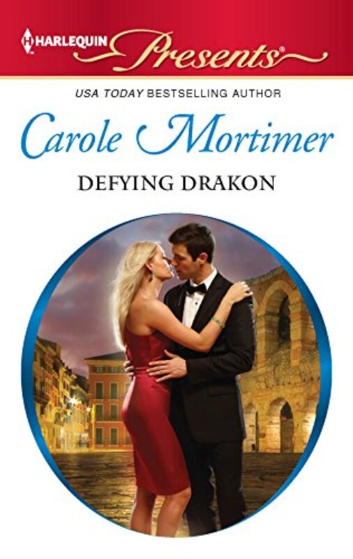Book cover for "Defying Drakon" by Carole Mortimer