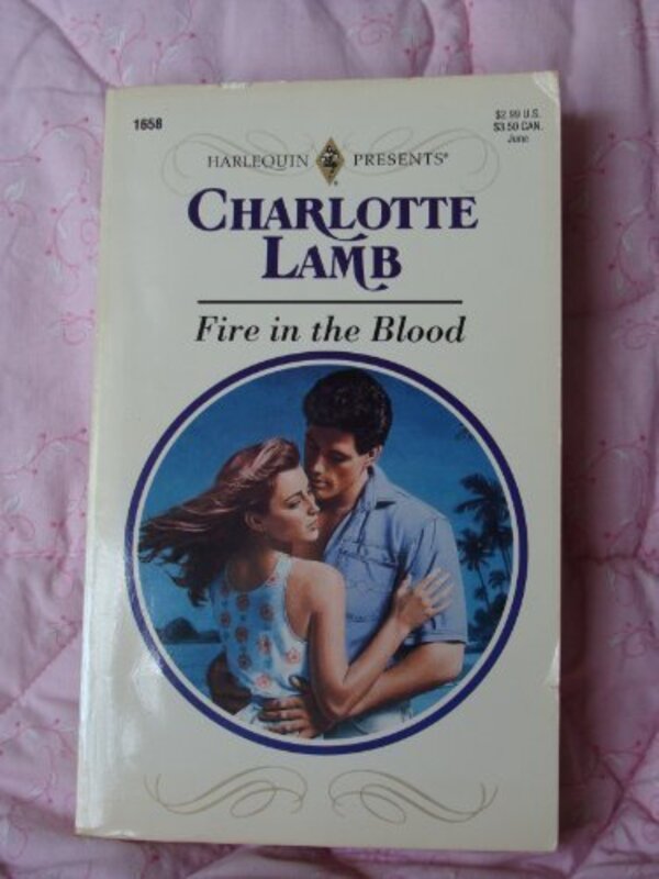 Book cover for "Fire in the Blood" by Charlotte Lamb