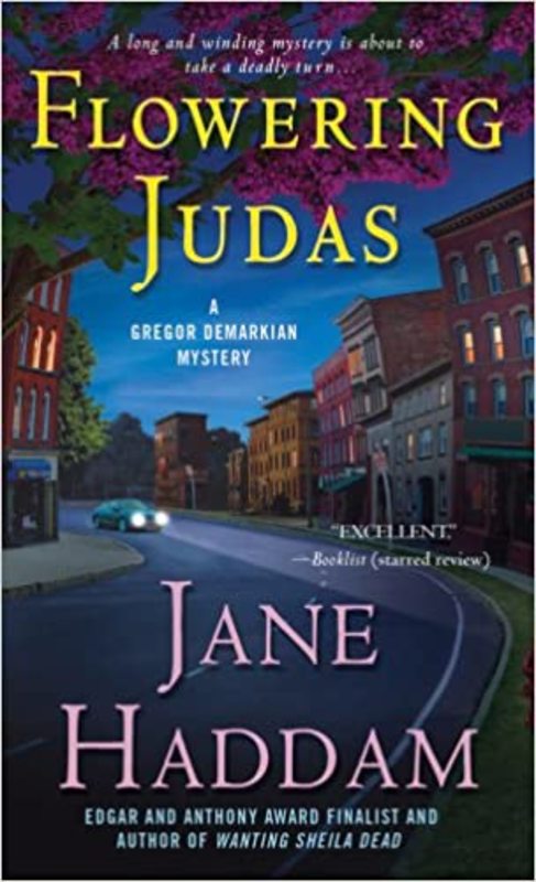 Book cover for "Flowering Judas" by Jane Haddam