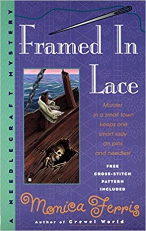 Book cover for "Framed in Lace" by Monica Ferris