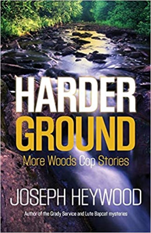 Book cover for "Harder Ground" by Joseph Heywood