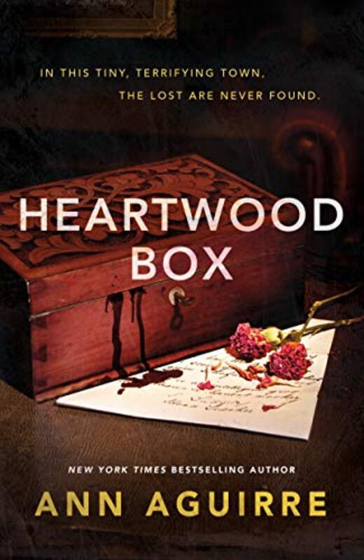 Book cover for "Heartwood Box" by Ann Aguirre
