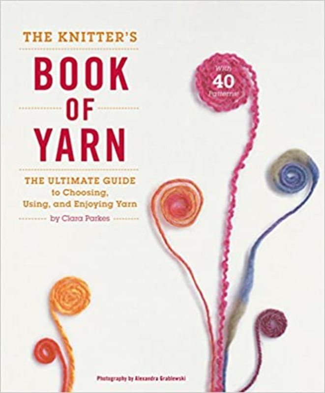 Book cover for "Herrschners® The Knitter's Book of Yarn" by Clara Parkes