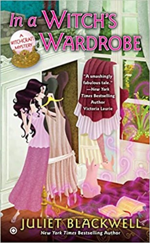 Book cover for "In a Witch's Wardrobe" by Juliet Blackwell