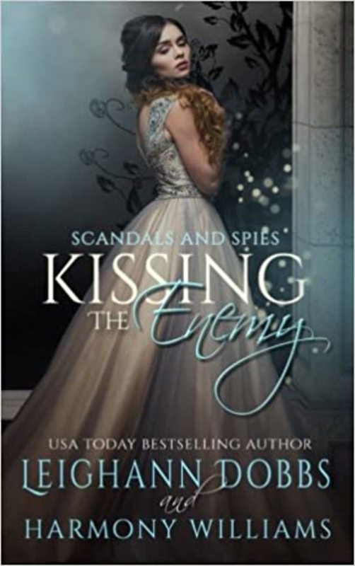 Book cover for "Kissing the Enemy" by Leighann Dobbs