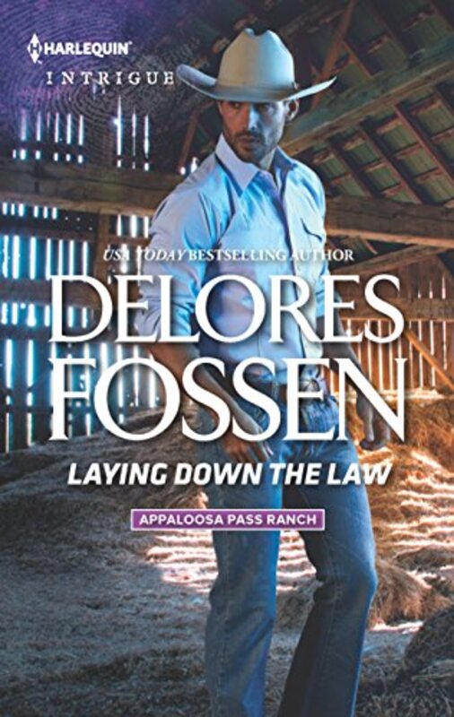 Book cover for "Laying Down the Law" by Delores Fossen