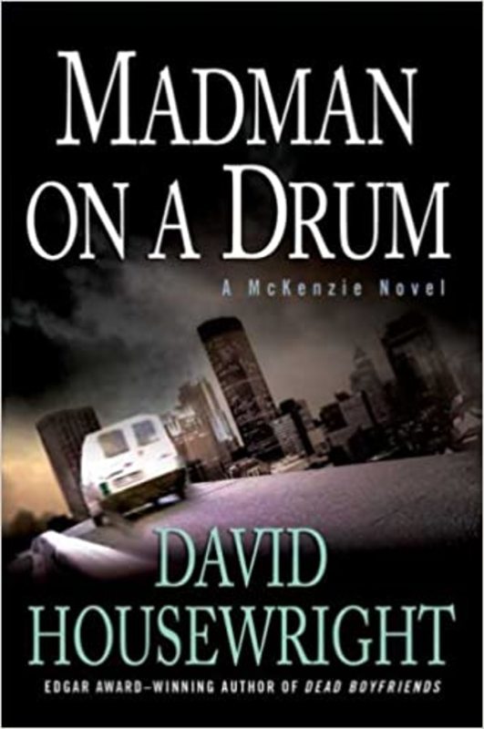 Book cover for "Madman on a Drum" by David Housewright