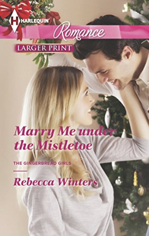 Book cover for "Marry Me Under the Mistletoe" by Rebecca Winters