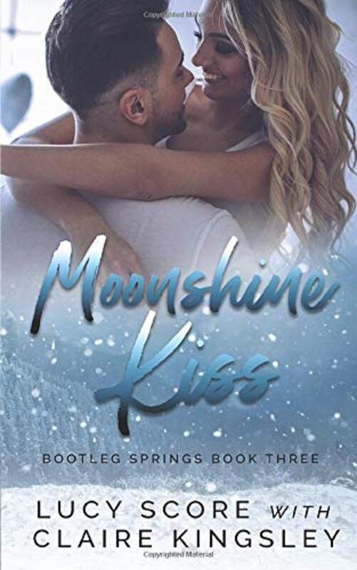 Book cover for "Moonshine Kiss" by Lucy Score