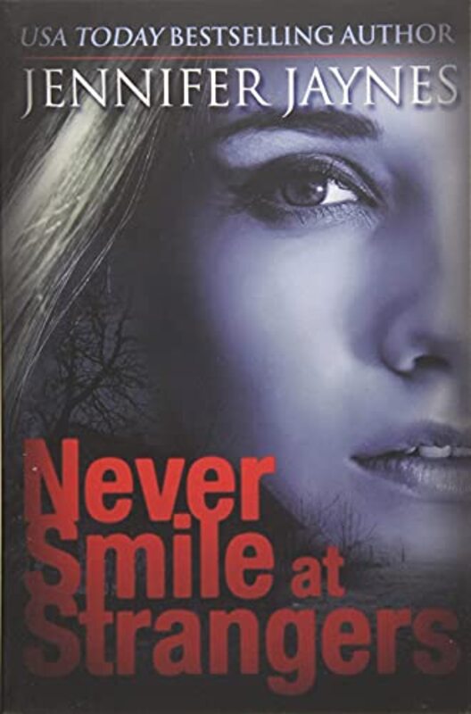 Book cover for "Never Smile at Strangers" by Jennifer Jaynes