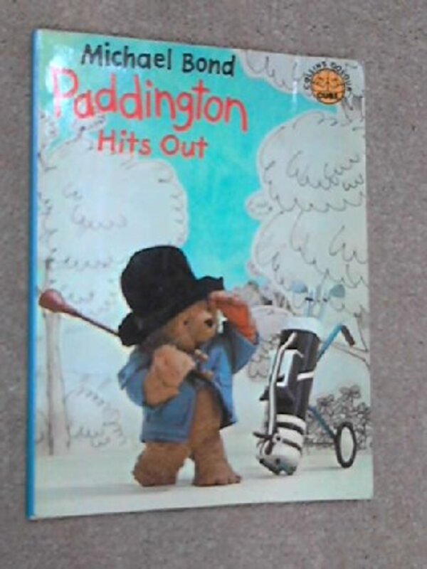 Book cover for "Paddington Hits Out" by Michael Bond