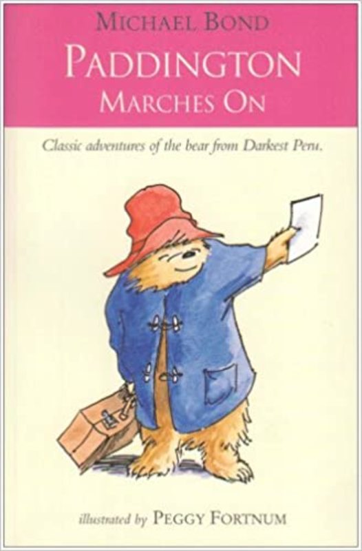Book cover for "Paddington Marches on" by Michael Bond