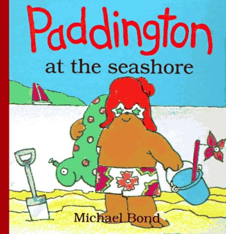 Book cover for "Paddington at the Seashore" by Michael Bond