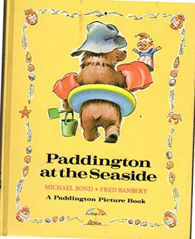 Book cover for "Paddington at the Seaside" by Michael Bond
