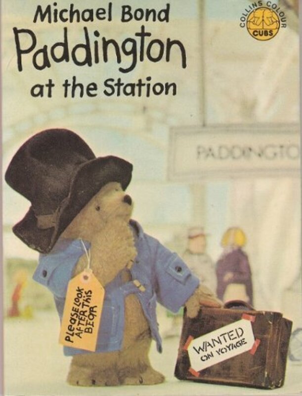 Book cover for "Paddington at the Station" by Michael Bond