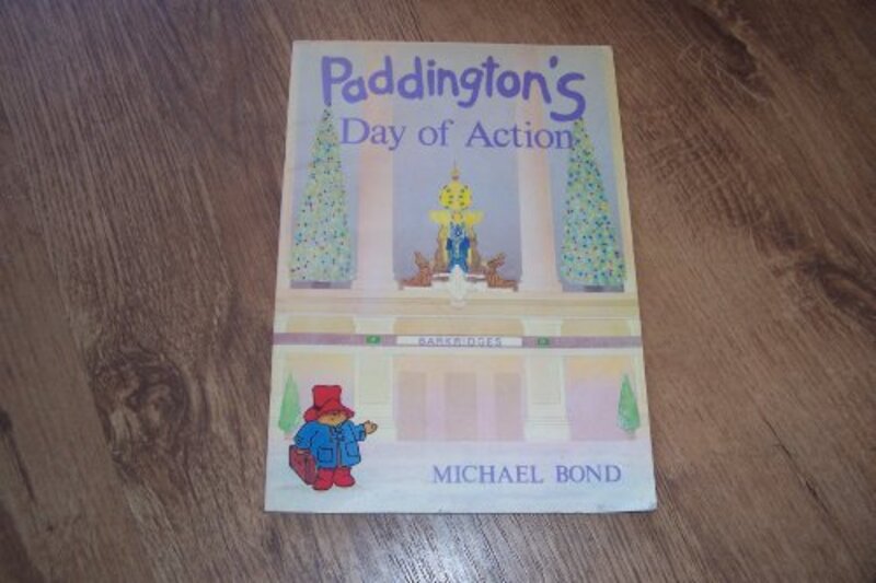 Book cover for "Paddington's day of action" by Michael Bond