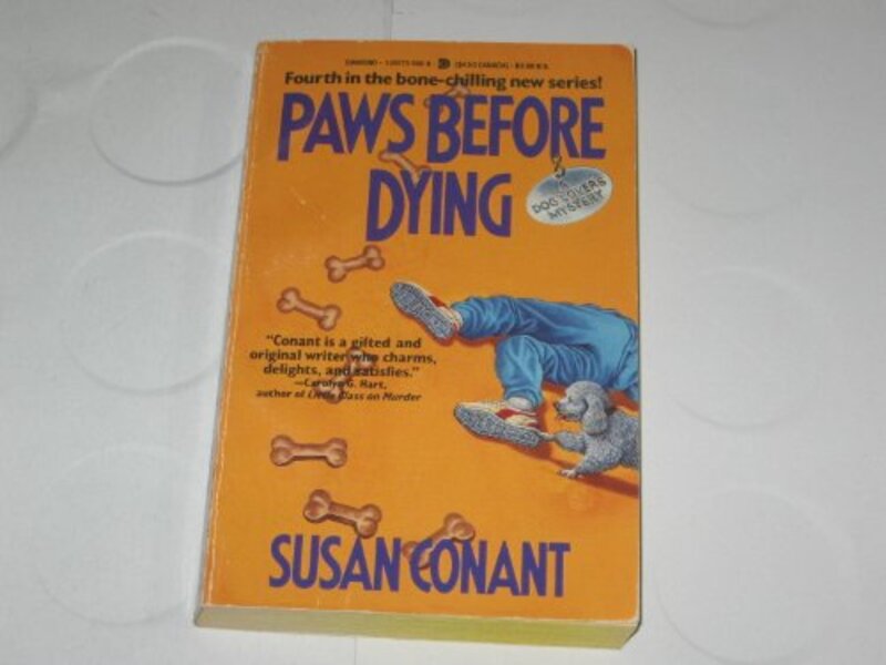 Book cover for "Paws Before Dying" by Susan Conant