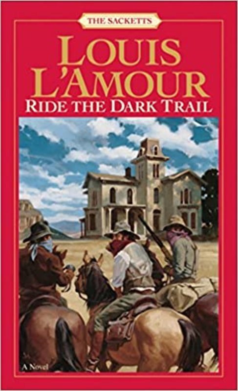 Book cover for "Ride the Dark Trail" by Louis LAmour