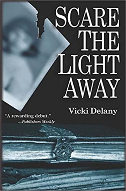 Book cover for "Scare the Light Away" by Vicki Delany