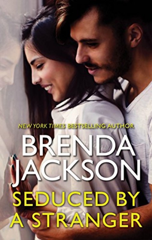 Book cover for "Seduced by a Stranger" by Brenda Jackson