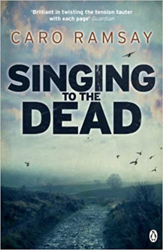 Book cover for "Singing to the Dead" by Caro Ramsay