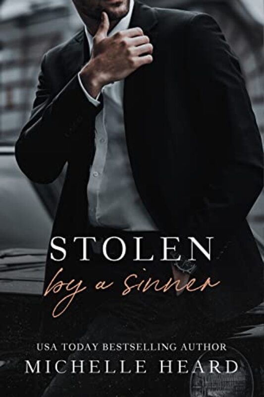 Book cover for "Stolen By A Sinner" by Michelle Heard