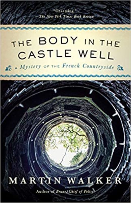 Book cover for "The Body in the Castle Well" by Martin Walker