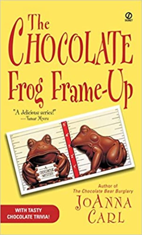 Book cover for "The Chocolate Frog Frame-Up" by JoAnna Carl