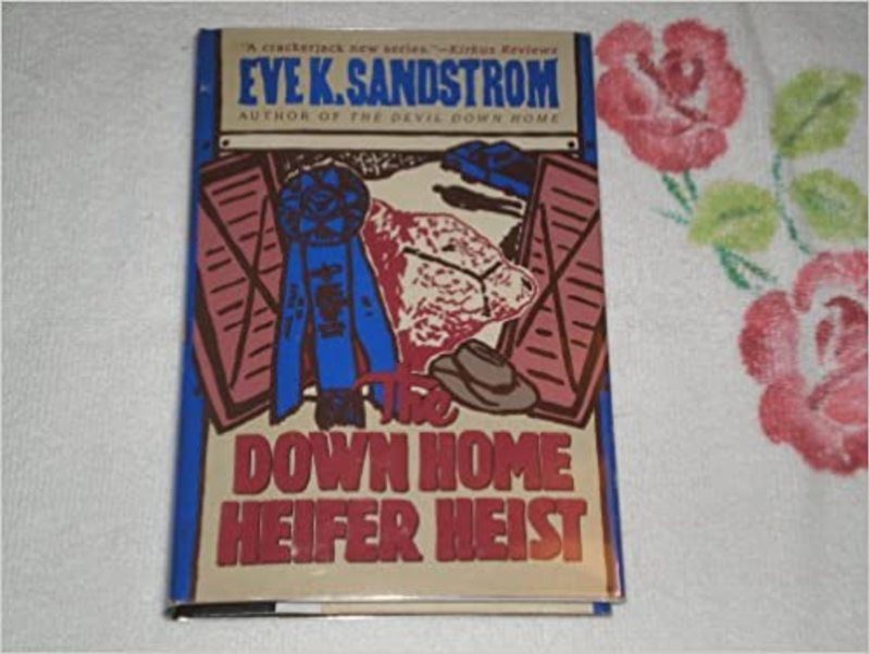 Book cover for "The Down Home Heifer Heist" by JoAnna Carl