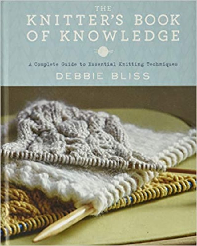 Book cover for "The Knitter's Book of Knowledge" by Debbie Bliss