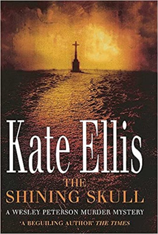 Book cover for "The Shining Skull" by Kate Ellis