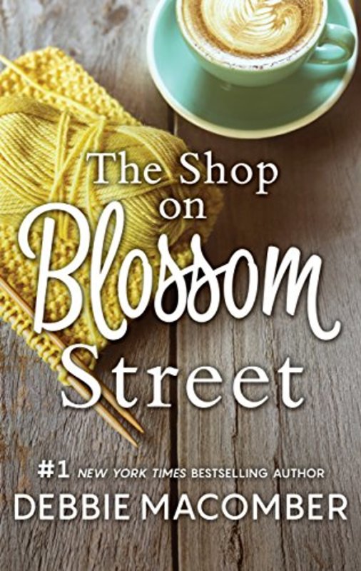 Book cover for "The Shop on Blossom Street" by Debbie Macomber
