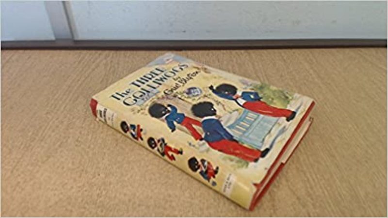 Book cover for "The Three Golliwogs" by Enid Blyton