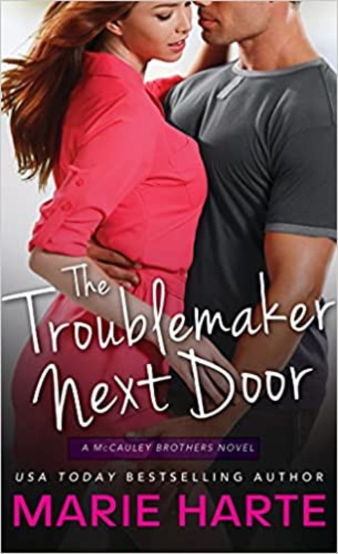 Book cover for "The Troublemaker Next Door" by Marie Harte