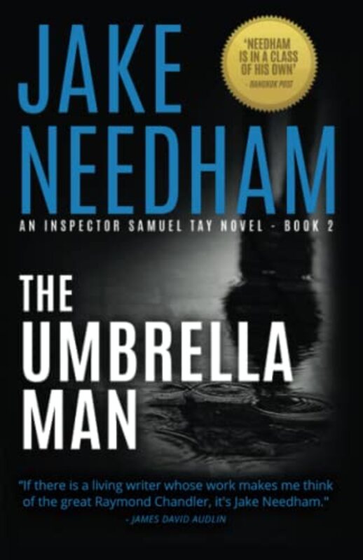 Book cover for "The Umbrella Man" by Jake Needham