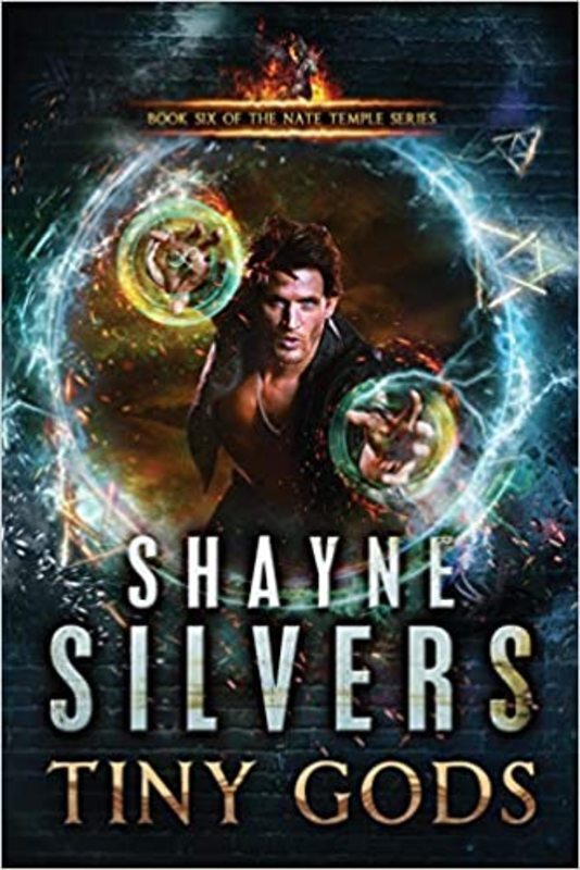 Book cover for "Tiny Gods" by Shayne Silvers